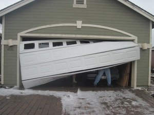 The reason for the noisy garage door and how it is fixed