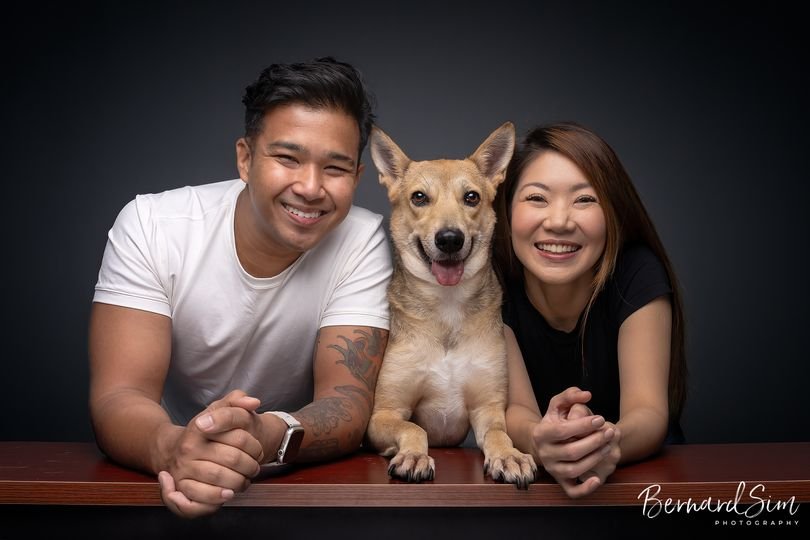 Happy family posing for a photoshoot